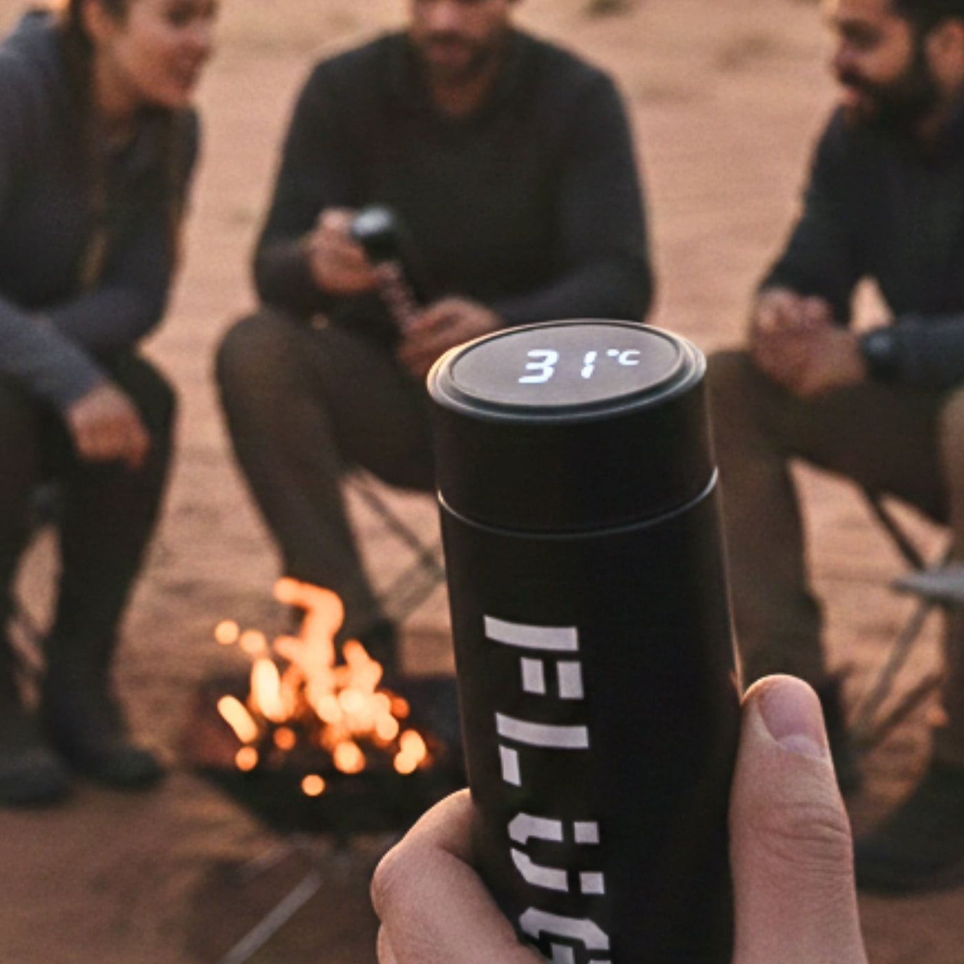 Black insulated stainless steel water bottle with LED temperature indicator